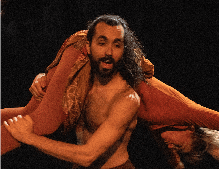 Performer lifts a fellow cast member during a dynamic moment from Flute Theatre’s adaptation of Shakespeare’s plays for Pericles.
